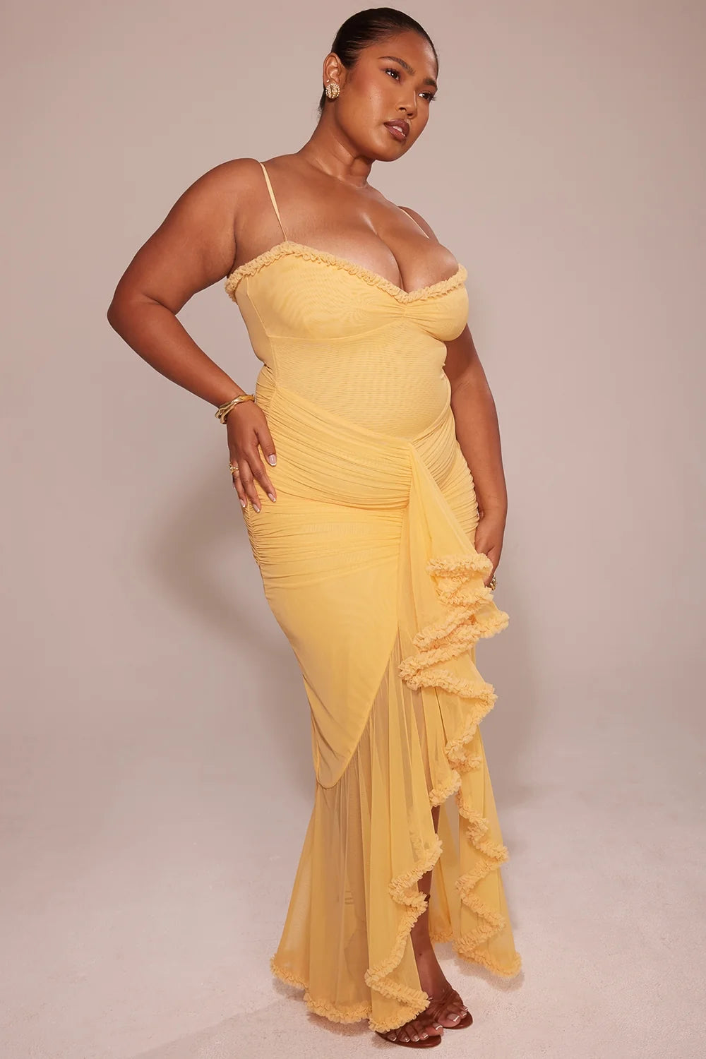 apricot ruffled front gown