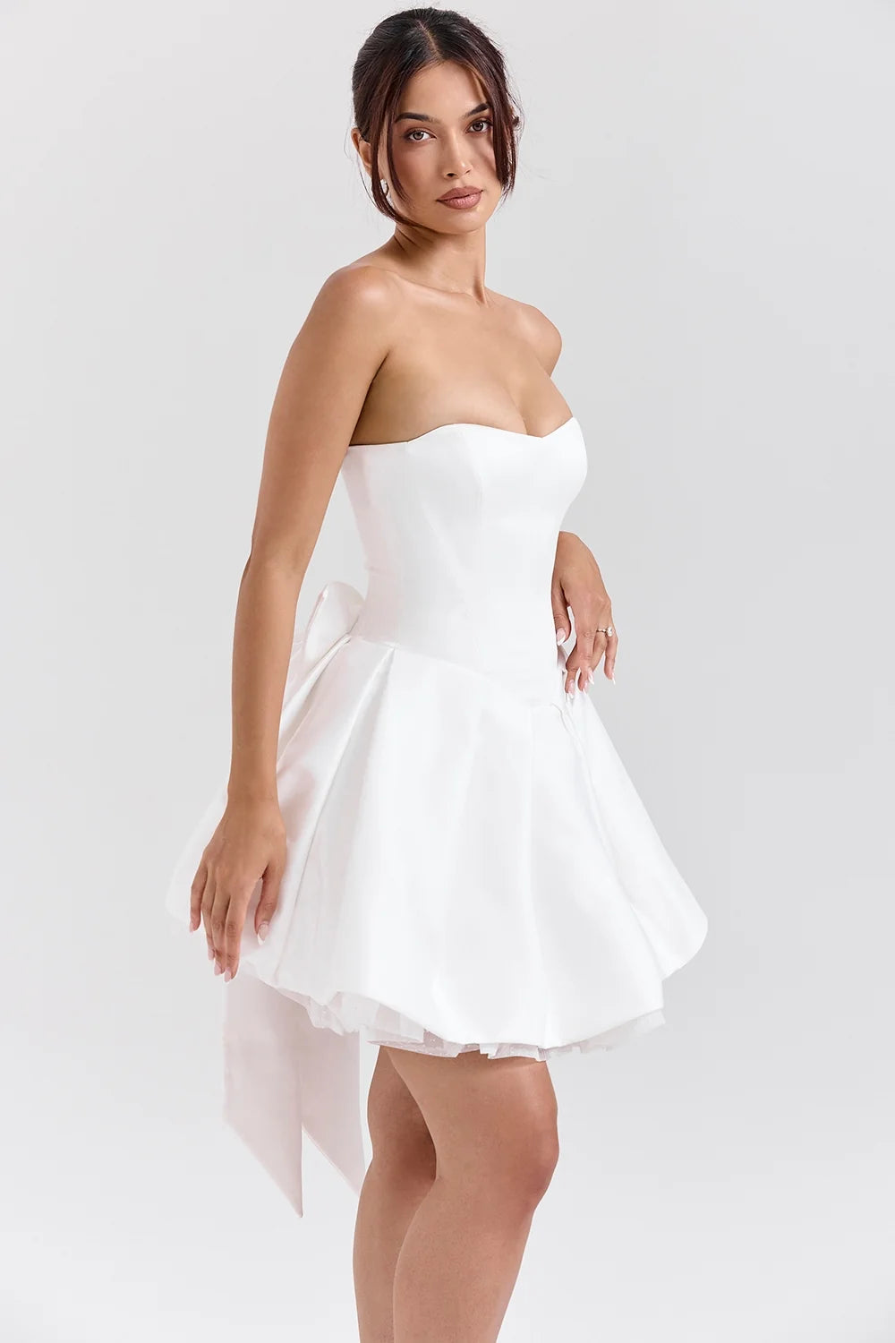 white satin strapless bow mini gown