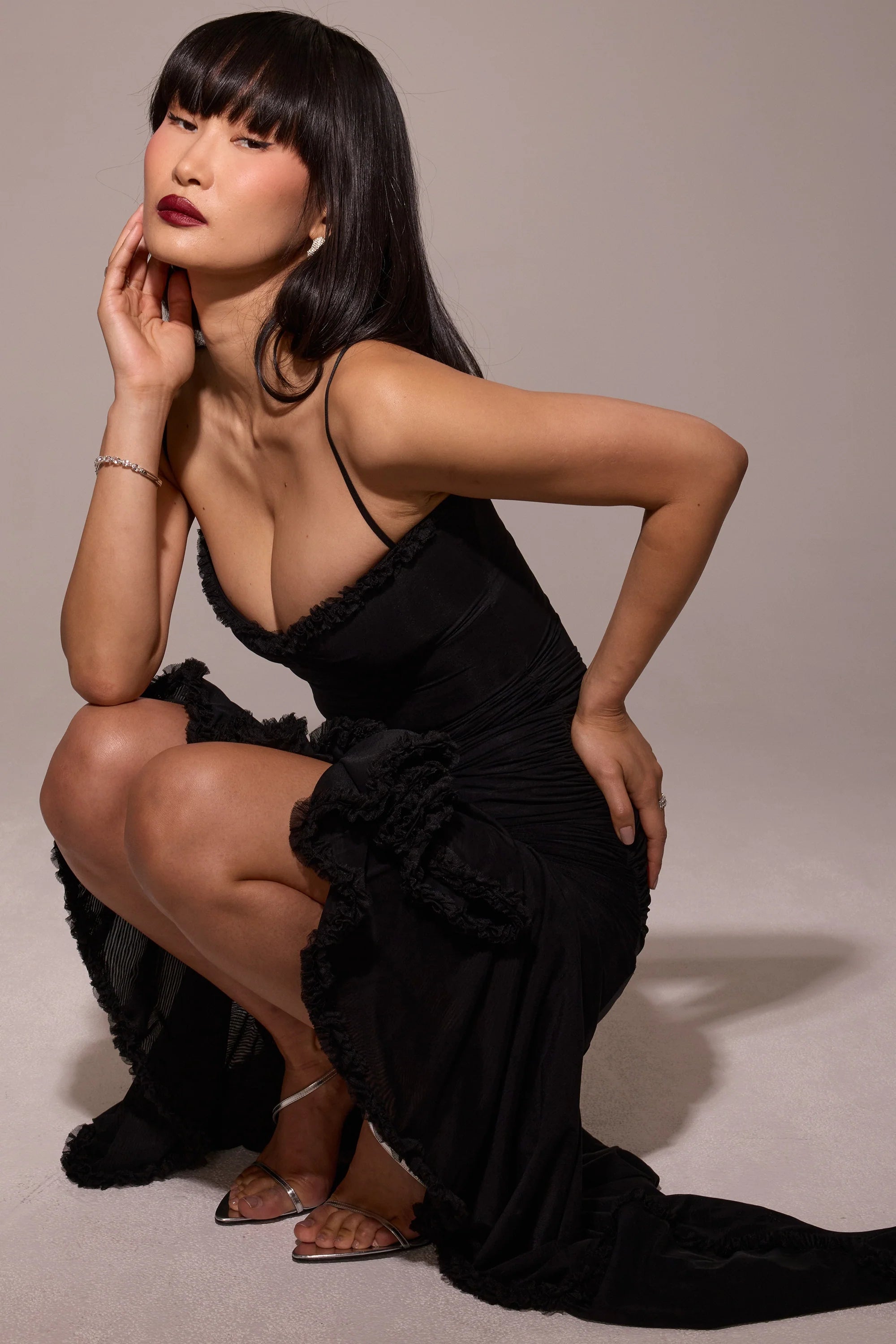 black mesh ruffled front gown
